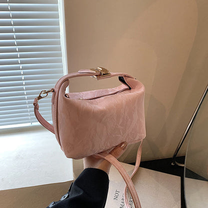 High-end handbag with a small square shape