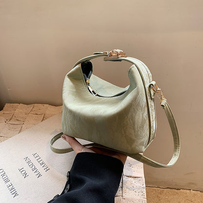 High-end handbag with a small square shape