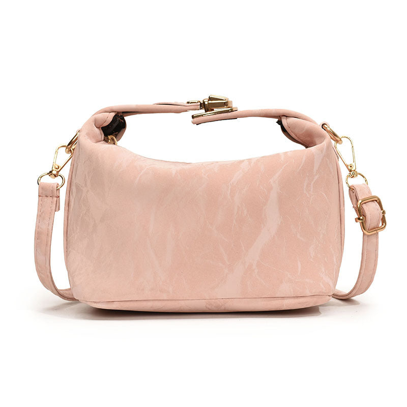 High-end handbag with a small square shape