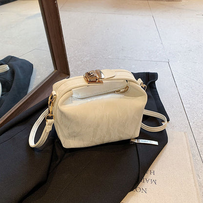 High-end handbag with a small square shape