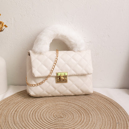 Diamond-patterned fuzzy handbag