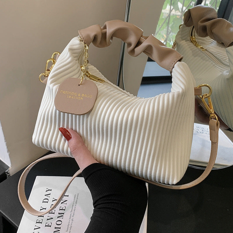 Textured vertical stripe handbag 2025 new niche design shoulder messenger bag foreign style all-match bag women's wholesale