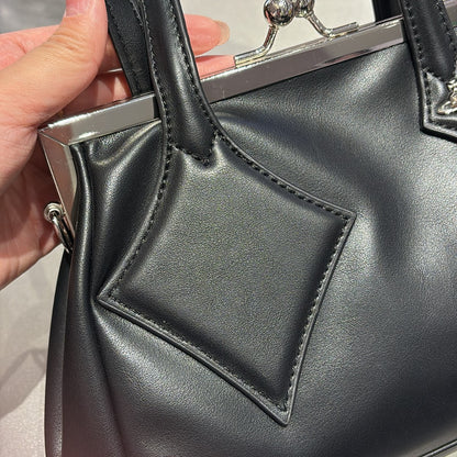 Versatile handbag with a slanted strap