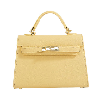 Textured snap closure handbag in small size