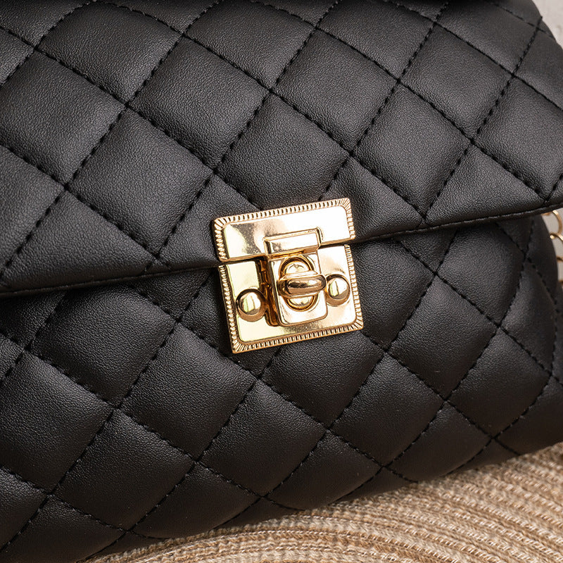 Diamond-patterned fuzzy handbag