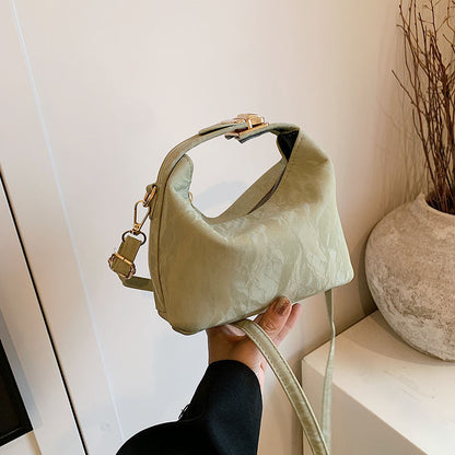 High-end handbag with a small square shape