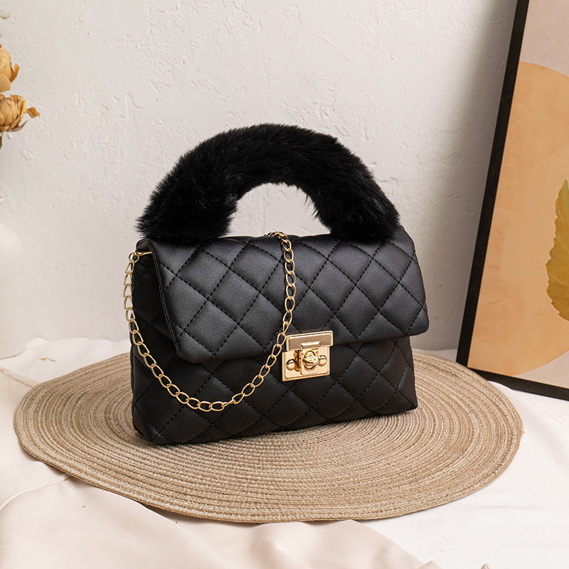 Diamond-patterned fuzzy handbag