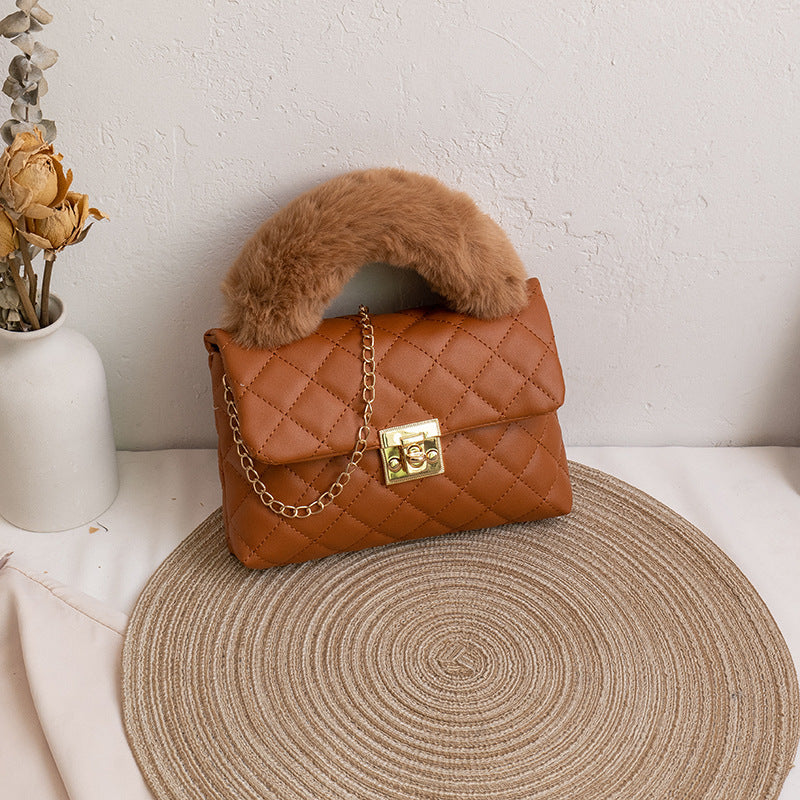 Diamond-patterned fuzzy handbag
