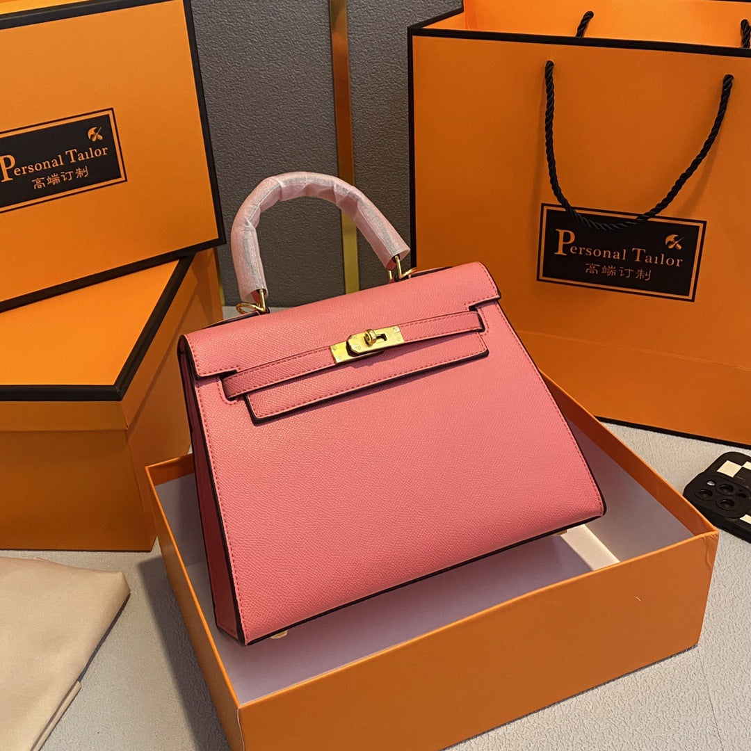 A fashionable women's handbag with a one-shoulder crossbody strap