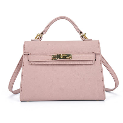 Textured snap closure handbag in small size