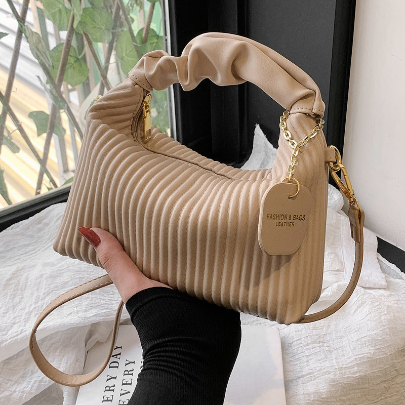 Textured vertical stripe handbag 2025 new niche design shoulder messenger bag foreign style all-match bag women's wholesale