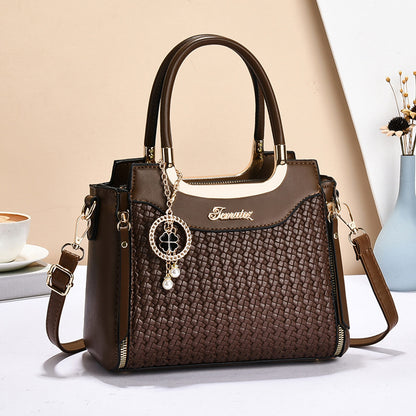 One-shoulder elegant lady's handbag by hand