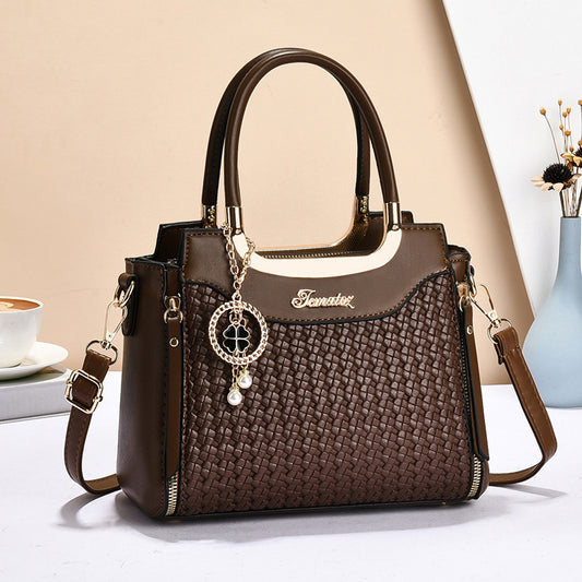 One-shoulder elegant lady's handbag by hand