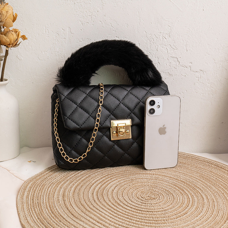 Diamond-patterned fuzzy handbag