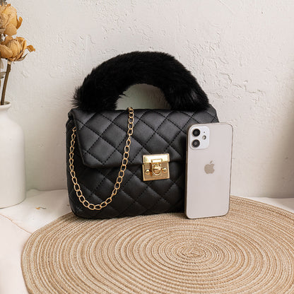 Diamond-patterned fuzzy handbag