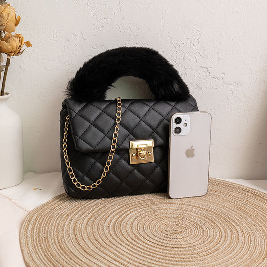 Diamond-patterned fuzzy handbag