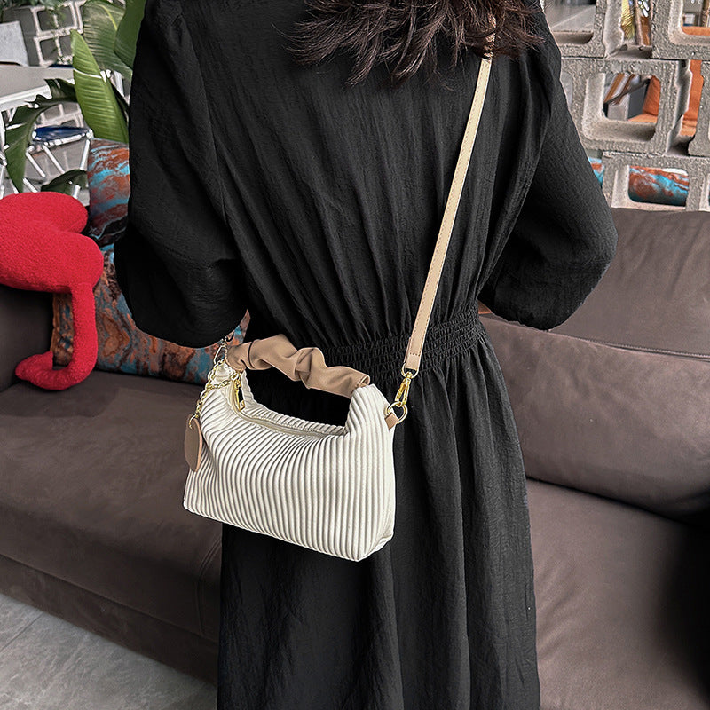 Textured vertical stripe handbag 2025 new niche design shoulder messenger bag foreign style all-match bag women's wholesale