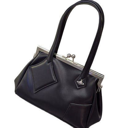 Versatile handbag with a slanted strap