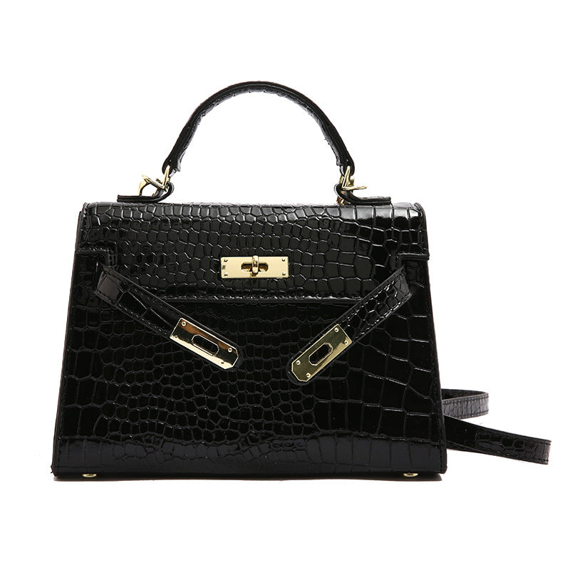 Textured snap closure handbag in small size